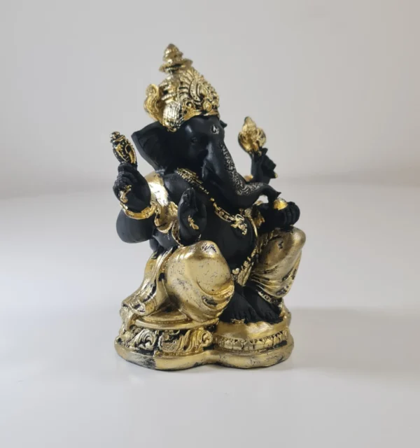 Figura de Ganesh dorada y negra