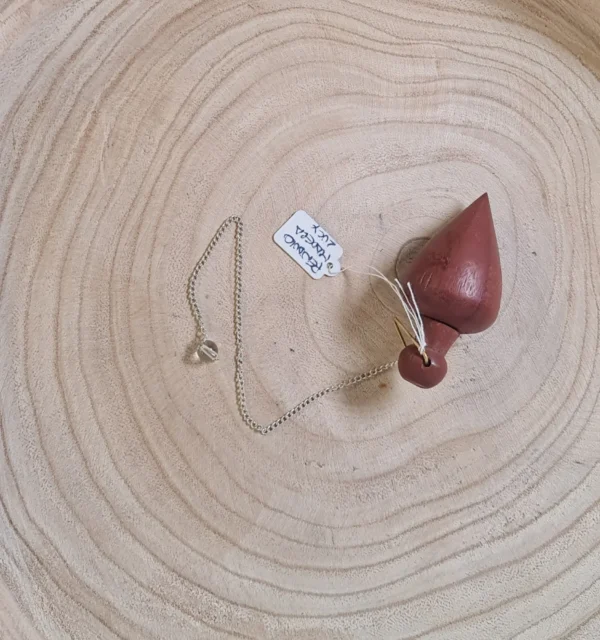Péndulo madera lucy