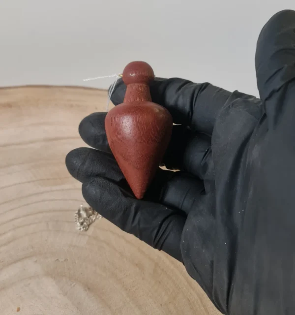 Péndulo madera lucy