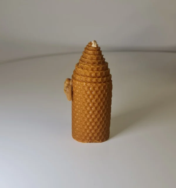 Vela de miel con abeja