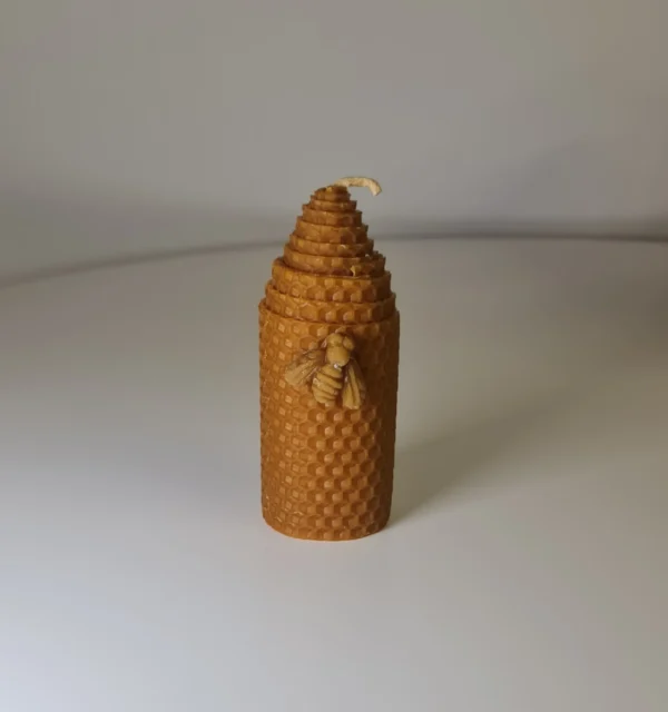Vela de miel con abeja
